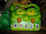 The highest shelf in the room. That's a "Monster in my Pocket" KRAKEN carrying-case!