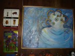 The second painting was created entirely by my Grandmother a few years before she passed away. She based it on a famous "ancient astronaut" artifact.